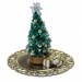 Miniature Christmas tree with presents on the tray. Doll