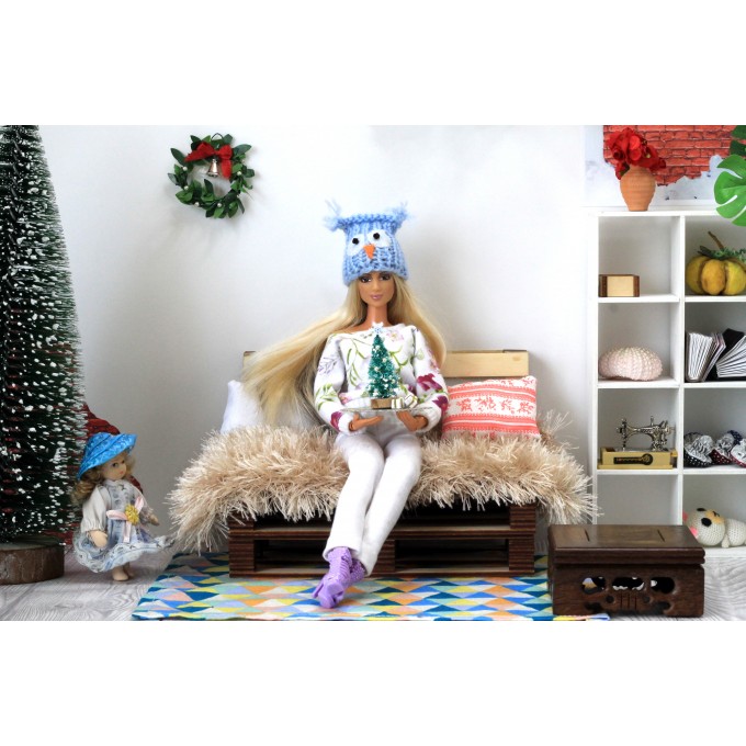 Miniature Christmas tree with presents on the tray. Doll