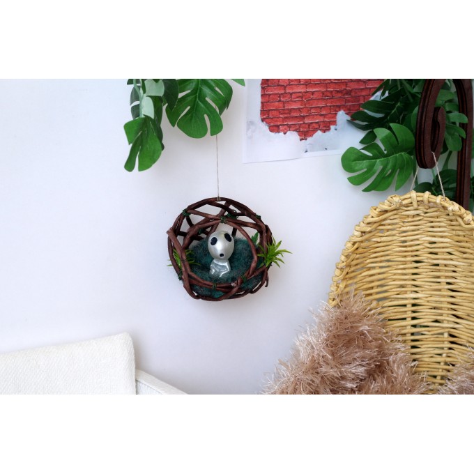 Miniature ghost sitting in the nest, dollhouse fairy forest