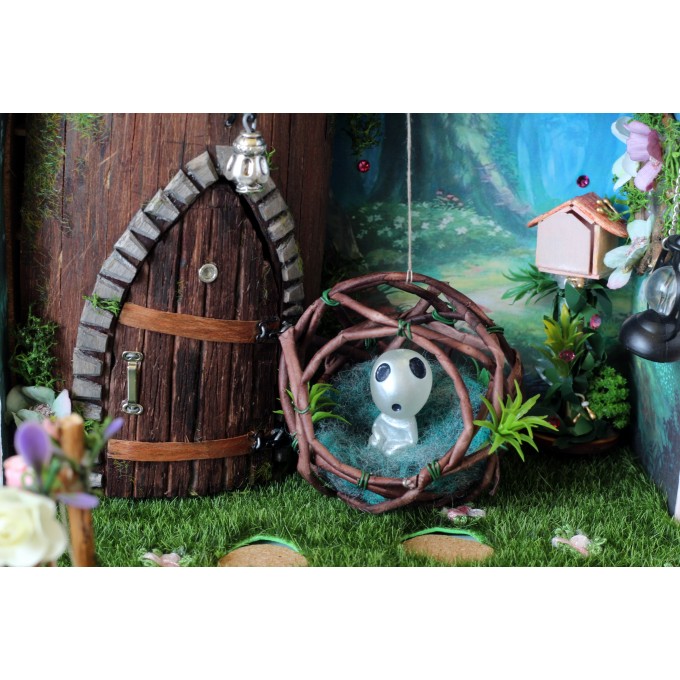 Miniature ghost sitting in the nest, dollhouse fairy forest