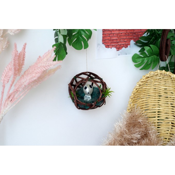 Miniature ghost sitting in the nest, dollhouse fairy forest