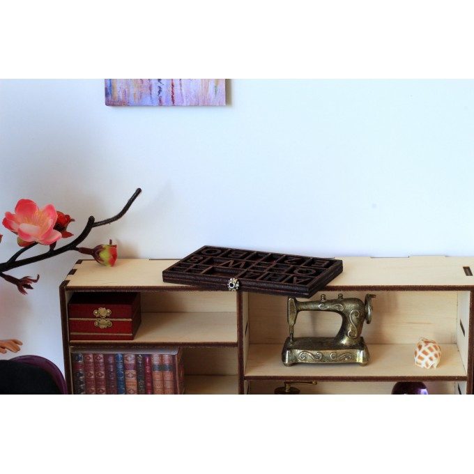 Miniature typography drawer with letters. Old