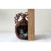 Miniature wicker hanging chair hideout with curled 