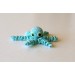 Miniature crochet octopus with hand painted eyes